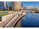 Scenic aerial view of Tampa Riverwalk featuring modern architecture along a beautiful waterfront, ideal for leisurely strolls at 1440 Harbour Walk Rd, Tampa, FL 33602