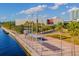 Scenic Tampa waterfront featuring the Tampa Museum of Art, lush greenery, and a waterfront park along the river at 1440 Harbour Walk Rd, Tampa, FL 33602