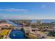 Sprawling aerial view showcasing the intricate waterways, bridges, and buildings within a bustling cityscape at 1440 Harbour Walk Rd, Tampa, FL 33602