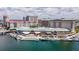 Waterfront view of a hotel complex next to a marina and commercial buildings at 1440 Harbour Walk Rd, Tampa, FL 33602