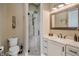 Traditional bathroom with glass shower, vanity, and toilet at 17630 Brown Rd, Odessa, FL 33556