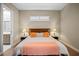 Bedroom with a neutral color scheme, a window with blinds, and wood-look floors at 17630 Brown Rd, Odessa, FL 33556