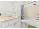 Bright bathroom with shower/tub combination and neutral vanity at 2075 Lakewood Club S Dr # 6A, St Petersburg, FL 33712