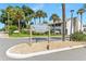 A beautiful Casablanca community sign on a well-manicured lawn, along with palm trees at 2075 Lakewood Club S Dr # 6A, St Petersburg, FL 33712