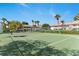 Enjoy a match on this on-site tennis court surrounded by palm trees and beautiful residences at 2075 Lakewood Club S Dr # 6A, St Petersburg, FL 33712