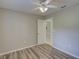 Bedroom with wood floors and a view to the next room at 2333 Appaloosa Cir, Sarasota, FL 34240