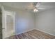 Bedroom featuring wood floors and a view to the bathroom at 2333 Appaloosa Cir, Sarasota, FL 34240