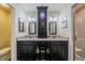 Bathroom featuring a modern vanity with granite counters, and a full shower and toilet at 2609 Locksley St, Sun City Center, FL 33573