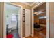 Hallway that showcases the bathroom and living room at 2609 Locksley St, Sun City Center, FL 33573