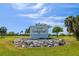 Rocky Point community sign with lush landscaping and a welcoming entrance at 3934 Doral Dr, Tampa, FL 33634