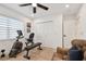 This exercise room features an exercise bike and weights, perfect for a home gym at 3934 Doral Dr, Tampa, FL 33634