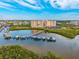 Scenic aerial view of the condo complex, showcasing its waterfront location, and stunning architectural design at 4516 Seagull Dr # 303, New Port Richey, FL 34652