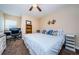 Spacious bedroom with ceiling fan, desk area, and a bookcase provides a comfortable living space at 4516 Seagull Dr # 405, New Port Richey, FL 34652