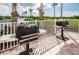 Outdoor grilling area features modern barbecue grills and well-maintained surrounding landscaping at 4516 Seagull Dr # 405, New Port Richey, FL 34652