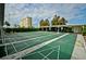 Shuffleboard courts with viewing area, surrounded by lush landscaping at a condominium complex at 4525 Cove Cir # 805, St Petersburg, FL 33708