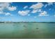 Scenic view of the water and sky with boats sailing on a clear day at 4525 Cove Cir # 805, St Petersburg, FL 33708