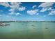 Scenic view of the water and sky with boats sailing on a clear day at 4525 Cove Cir # 805, St Petersburg, FL 33708