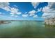 Scenic view of the water and sky with boats sailing on a clear day at 4525 Cove Cir # 805, St Petersburg, FL 33708