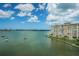 Scenic waterfront view showcasing the building's location, complete with boats and a clear horizon at 4525 Cove Cir # 805, St Petersburg, FL 33708