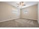 Bedroom featuring carpet floor, baseboard trim and natural light at 5020 16Th N Ave, St Petersburg, FL 33710