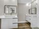 Modern bathroom features a double vanity and walk-in shower at 525 Lamara Ne Way, St Petersburg, FL 33704