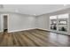 A bedroom with wood flooring, recessed lighting, and natural light at 525 Lamara Ne Way, St Petersburg, FL 33704