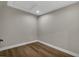 Cozy room with recessed lighting and wood-look flooring at 525 Lamara Ne Way, St Petersburg, FL 33704