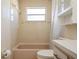 Bathroom with tub, toilet and vanity at 7353 Knoll Dr, New Port Richey, FL 34653