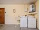 Laundry room with washer, dryer and sink at 7353 Knoll Dr, New Port Richey, FL 34653