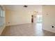 Bright living room with tile floors and sliding glass doors at 7353 Knoll Dr, New Port Richey, FL 34653