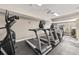 Bright fitness center featuring treadmills, elliptical machines, and views of the surrounding landscape at 800 S Dakota Ave # 205, Tampa, FL 33606