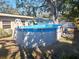 An inviting above-ground pool in the backyard at 9838 53Rd N Ave, St Petersburg, FL 33708