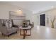 Elegant foyer with neutral tones, stylish seating, and decorative accents at 10100 Paradise Blvd, Treasure Island, FL 33706