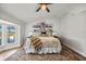 Bedroom showcasing decorative rug and a bright bay window at 10562 99Th St, Largo, FL 33773