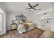 Bedroom with decorative rug and picture frames adorning the wall at 10562 99Th St, Largo, FL 33773