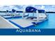 AquaBanas floating platform on a lagoon with seating, a table, and sunshade canopies at 10646 Pepper Dawn Cir, San Antonio, FL 33576