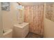 This bathroom features a vanity with a shower and tub at 114 W Saint Johns Way, Apollo Beach, FL 33572