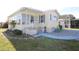 Charming home with a small, comfortable front yard at 114 W Saint Johns Way, Apollo Beach, FL 33572