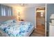 Comfortable main bedroom with a soft bed, and ensuite bathroom at 114 W Saint Johns Way, Apollo Beach, FL 33572