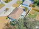 An aerial view of a single Gathering home with a patio and screened in lanai at 1211 Carolyn Ln, Clearwater, FL 33755