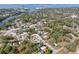 An aerial view of a neighborhood with bay views showing the location of a single Gathering home at 1211 Carolyn Ln, Clearwater, FL 33755