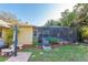 A lovely screened in lanai and pool in a private backyard with mature landscaping at 12478 93Rd Way, Largo, FL 33773