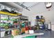 Organized garage with shelving units for ample storage space for tools and equipment at 12704 Vander Way, New Port Richey, FL 34654