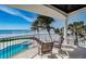 Enjoy beautiful ocean views from this condo's private balcony overlooking the pool and beach at 15912 Gulf Blvd, Redington Beach, FL 33708