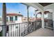 Balcony view of the street, showcasing the home's architecture and neighborhood at 15912 Gulf Blvd, Redington Beach, FL 33708