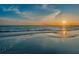 Peaceful sunset at the beach with calm ocean water and beautiful colors at 15912 Gulf Blvd, Redington Beach, FL 33708