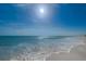 Beautiful beach with white sand and gentle waves rolling onto the shore at 15912 Gulf Blvd, Redington Beach, FL 33708