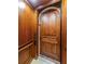 Interior of the elevator showing the wood-paneled walls and the elevator door at 15912 Gulf Blvd, Redington Beach, FL 33708