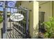 Royal Orleans gated entrance showcasing lush landscaping for privacy and curb appeal at 16333 Gulf Blvd # 108, St Petersburg, FL 33708