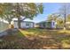 Spacious backyard with large tree and shed at 167 83Rd N Ave, St Petersburg, FL 33702